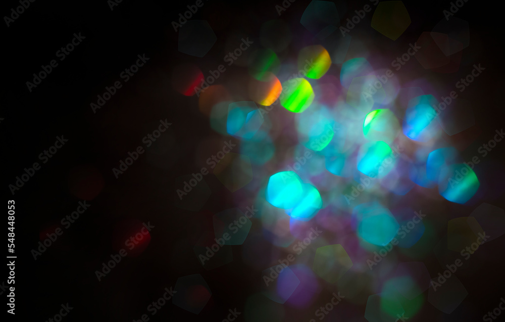 Wall mural multicolored bright bokeh on black background with copy space