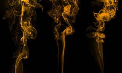 yellow smoke abstract on black background for design