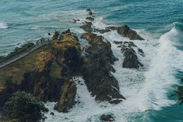 Seascape waves smashing rocks aerial view