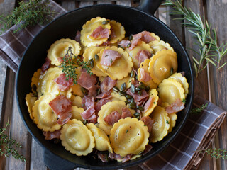 Italian filled pasta with mushroom filling. Cooked with ham, herb and butter. Topped with roasted...