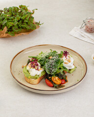 Portion of gourmet avocado toast with poached egg