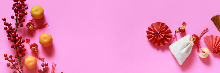 Chinese symbols on pink background with space for text. New Year banner