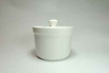white ceramic container with a white background