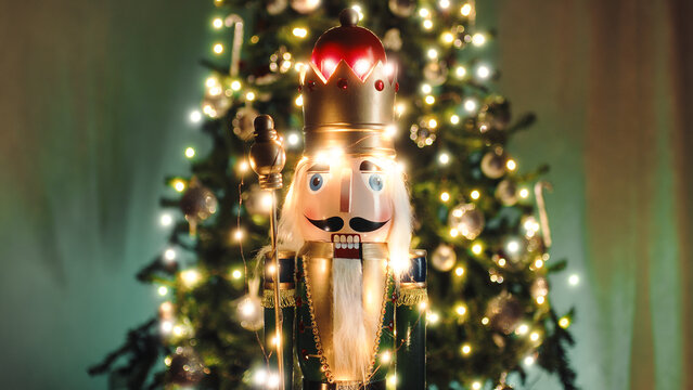 Nutcracker puppet Christmas against the Christmas tree