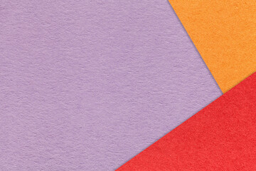 Fototapeta na wymiar Craft purple color paper background with red and orange border. Vintage violet cardboard. Presentation template