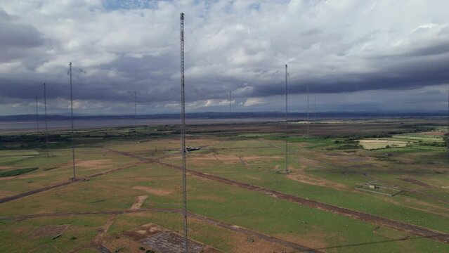 Aerial view of tall radio masts at Anthorn Radio station, Solway Firth, Cumbria