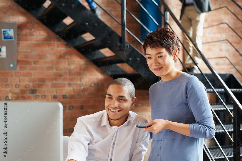 Poster man, computer and business leader training employee at work desk pc, web design team and interracial