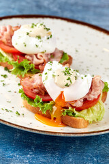 poached eggs on the toasts