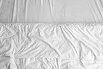 Closeup view of white bedding