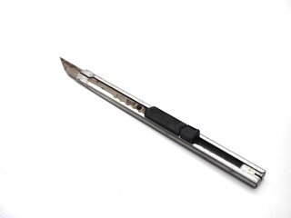 Stainless steel cutter knife on white background.