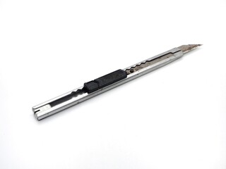 Stainless steel cutter knife on white background.
