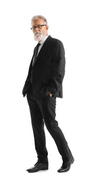 Senior bearded man in eyeglasses and black suit on white background