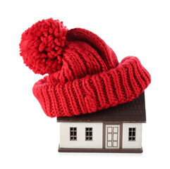 House model with red hat on white background. Heating concept
