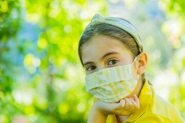 Little girl with mask