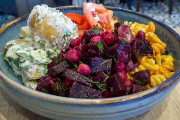 Healthy homemade colourful mixed vegetarian salad served in a bowl