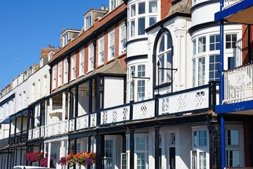 Front view of Hotel buildings with pretty balconies alongside the promenade, Sidmouth, Devon, UK, Europe