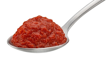 Tomato paste in spoon isolated on white background