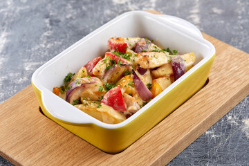 chicken with baked potatoes and vegetables