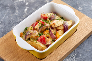 chicken with baked potatoes and vegetables