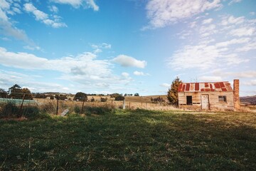 Old rustic timber homestead with rusting corrugated iron roof