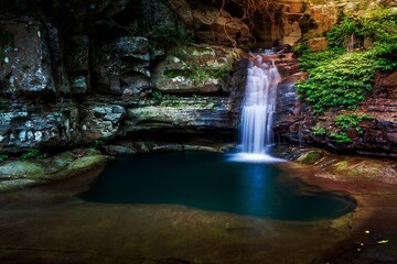 Waterfall into a rock pool deep in the wilderness