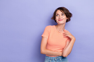 Portrait photo of young cute girlish lady wear stylish outfit posing dreamy interested look empty space shoppin season isolated on violet color background