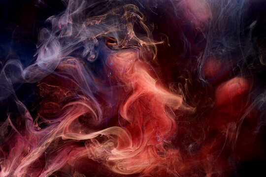 Blue red ink abstract background. Acrylic paint backdrop for perfume, hookah, cosmetics. Mysterious smoke clouds, colorful fog