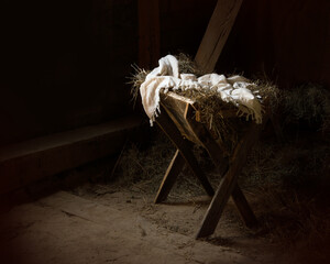 Manger in the stable with the linen - obrazy, fototapety, plakaty