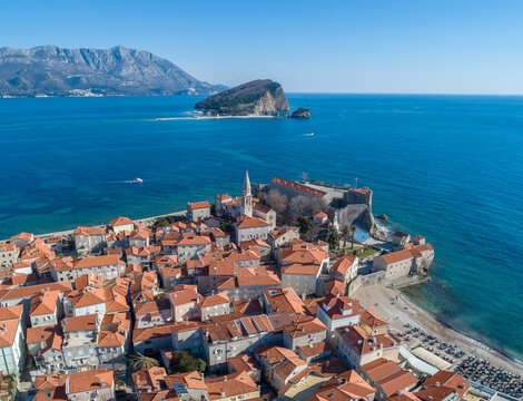 Old town in Budva in a beautiful summer day, Montenegro. Aerial image