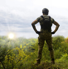 Sad soldier look to the sky