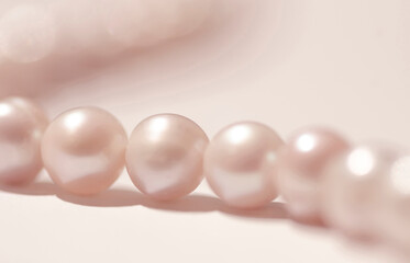 Macro of pink pearls. Copy space on image.