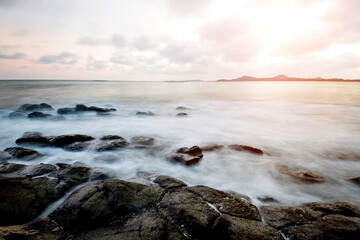 Sunset on the rocky shore.