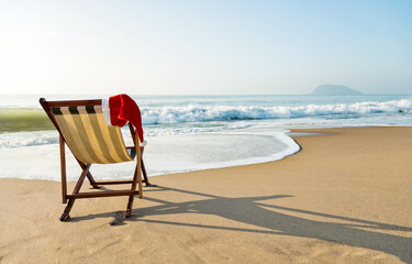 Close-up santa hat on beach chair.