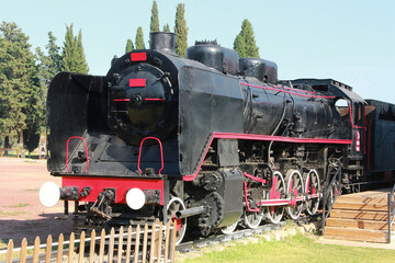 Vintage rare black steam locomotive with red decorative trim
