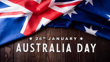 Fototapeta na wymiar Happy Australia day concept. Australian flag against old wooden background. 26 January.