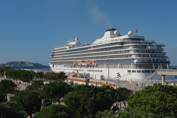 Fototapeta premium Viking luxury cruiseship or cruise ship liner Sea in Marseille Provence port during sunrise twilight blue hour Mediterranean cruise dream vacation