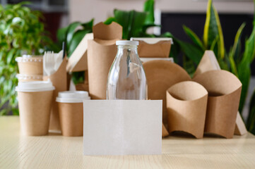 White empty sheet on the background of eco-friendly utensils and objects. Zero waste concept