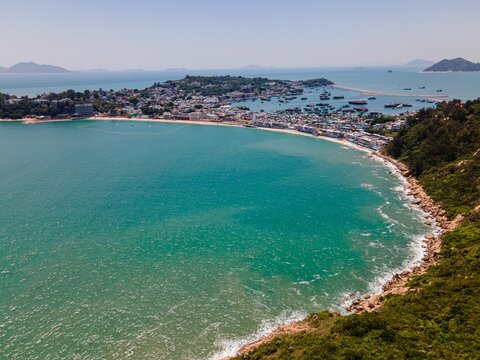 Aerial view of the forested coast and sea in Cheung Chau, Hong Kong