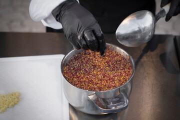 Preparing  Sumac in saucepan