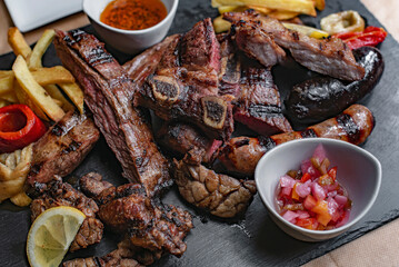 Meat platter cooked on the grill in Argentine style