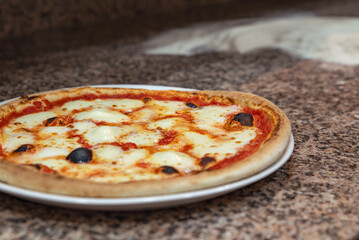 Freshly baked Margherita pizza close-up