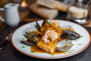 Stuffed pancake with shrimps and mussels