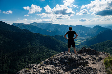 Fototapeta premium Man on the hill in Small Fatra mountains in Slovakia, Europe