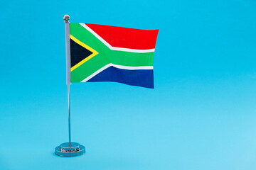 South Africa table flag waving on blue background