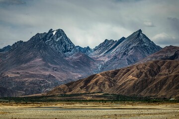 Beautiful scenery of rocky high mountains in Gongga County, Tibet, China