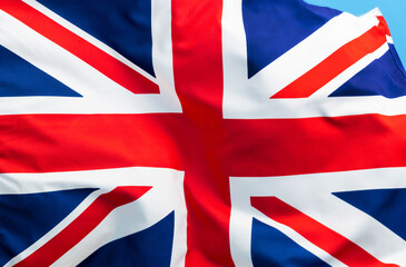 British flag waving on blue background