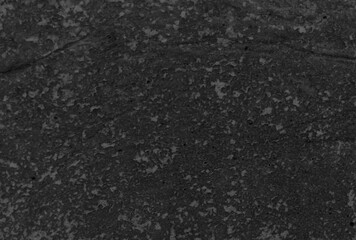Abstract dark black grunge texture, Close up retro plain dark black ancient and dusty cement concrete wall texture, black background illustration for construction and design.