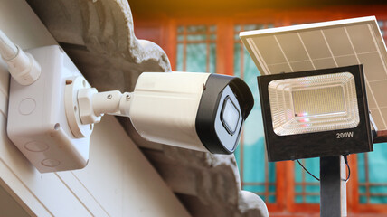 Home photovoltaic system including security camera and solar spotlight to provide safety for inhabitants                               
