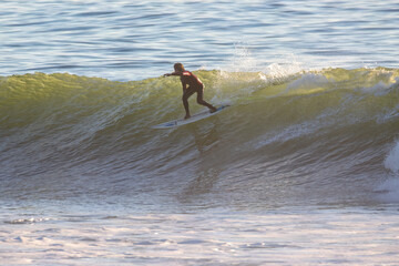 Surfing big winter waves at Ventura Point in California