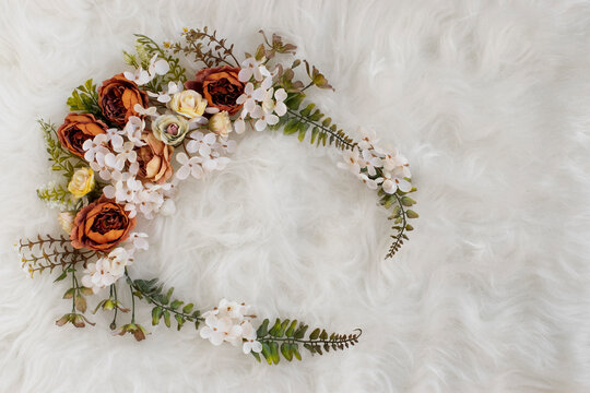 Newborn digital backdrop with handmade wreath of flowers. Newborn background. Top view. Flat lay.
